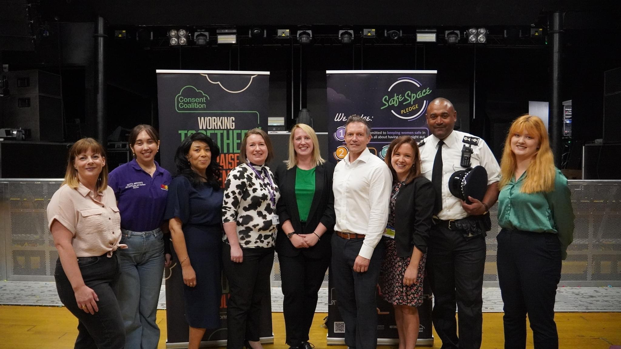 Representatives from the Consent Coalition, the Notts SVSS, Notts Police, NTUSU, Its In Nottingham and Rock City stand with Jess Phillips MP