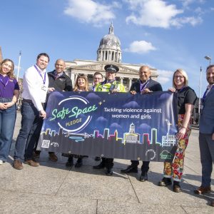 Representatives with Safe Space Pledge banner