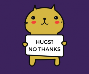 Picture of a cat holding up a banner saying 'Hugs? No thanks'