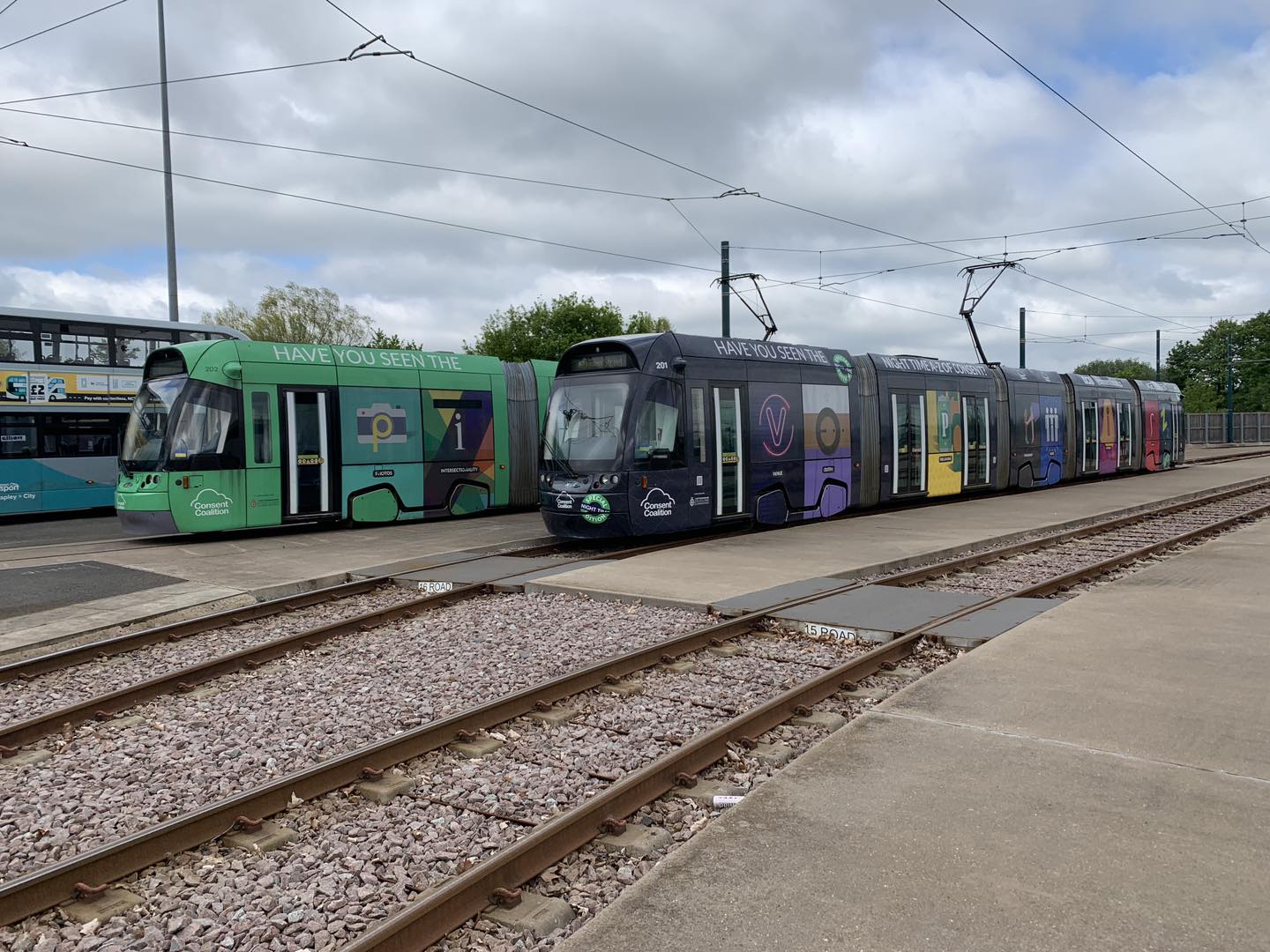the-two-trams-the-green-one-with-the-original-a-z-of-consent-and-the-grey-one-with-the-night-time-a-z